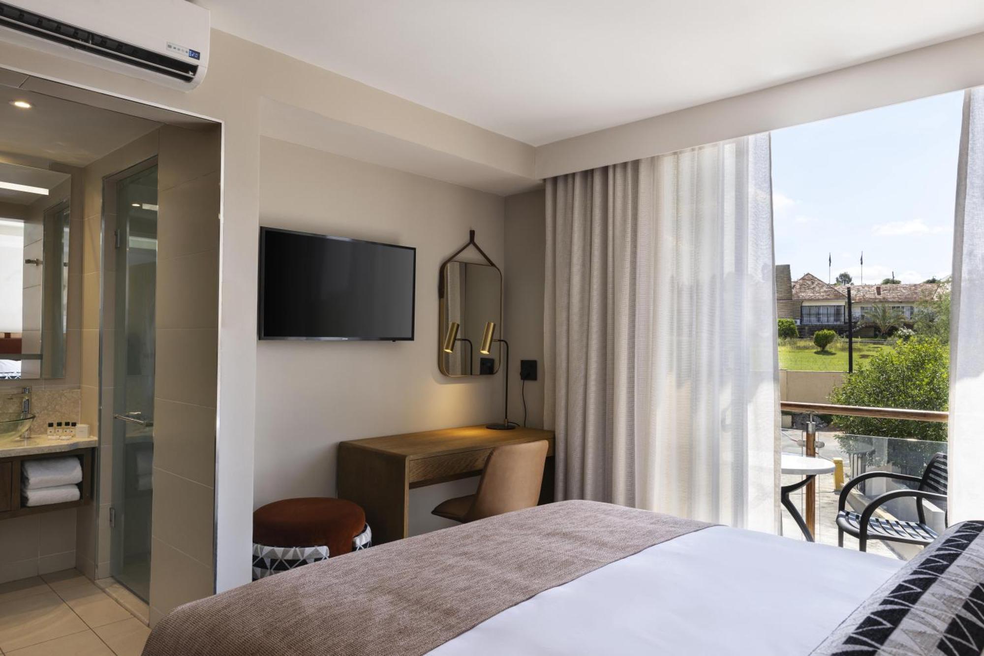 Mpilo Boutique Hotel Масеру Экстерьер фото